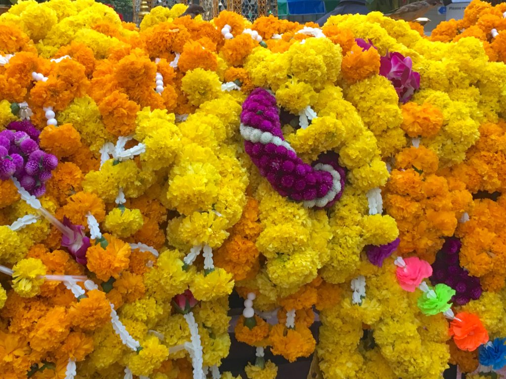 Flower offerings at the Erawan shrine in Bangkok